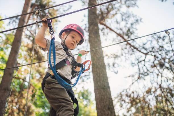 istock Cute little boy in an adventure park 1198982659