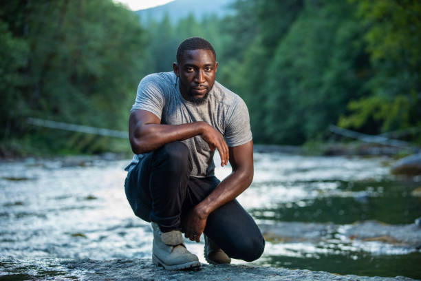 istock Man Enjoying the Outdoors in a Beautiful Setting 1198985035