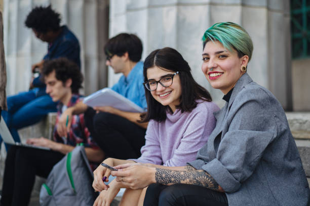 istock Portrait of smiling female students 1198985237
