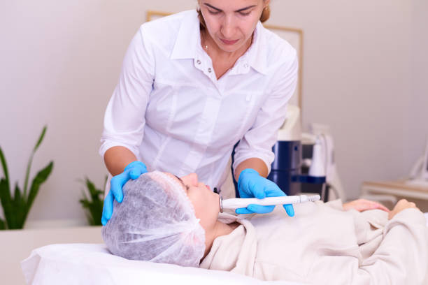 istock RF face lifting procedure in a cosmetology clinic. 1198989992