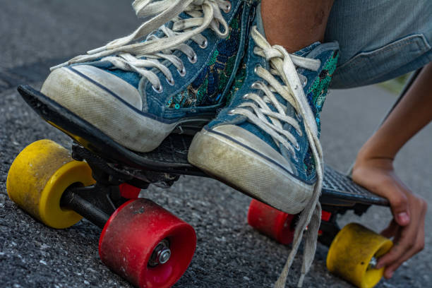istock Skater shoes on skateboard 1198990693