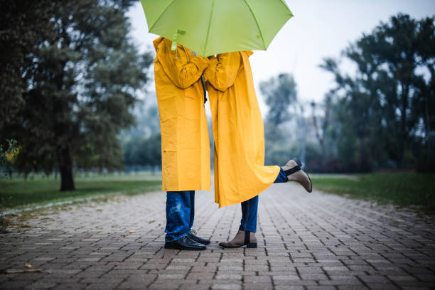 istock Romantic kiss under the umbrella! 1198991175