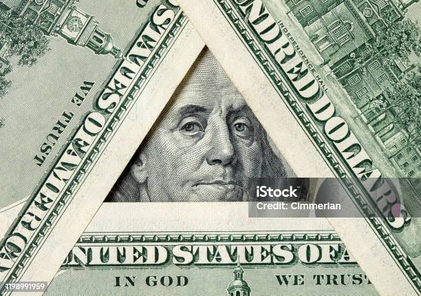 Triangle Made Of 100 Bills With Benjamin Franklin Inside Stock Photo - Download Image Now