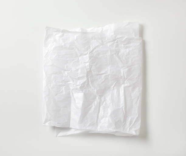 Crumpled white waxed packing paper