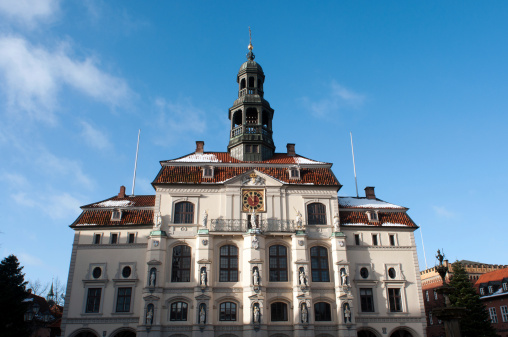 Karlsruhe, Germany - March, 26. 2022: View to town square with fountain and pyramid in Karlsruhe. Located in pedestrian zone.