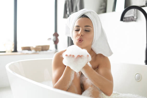 istock Enjoy a foam relaxing in bathtub 1198998216