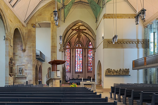 Stuttgart, Germany - May 21, 2018: Interior of Stiftskirche (Collegiate Church). The church was built in 1240 in the Romanesque style. The Gothic choir was added in 1321-1347, which is essentially visible in its original form today. The Late Gothic nave was added in the second half of the 15th century. In 1944, the church was heavily damaged by the bombing raids on Stuttgart. The church was rebuilt in the 1950s.
