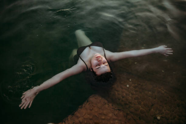 Beautiful woman in thermal pool