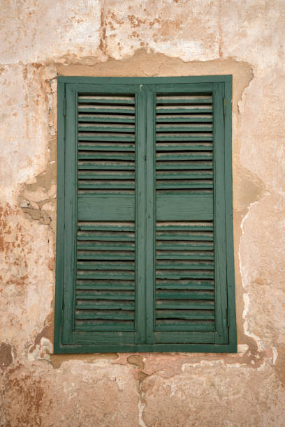 istock antique old wooden window shutters as background 1199008923