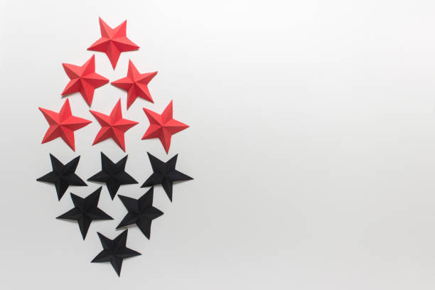 istock Red and black folded origami paper stars 1199010241