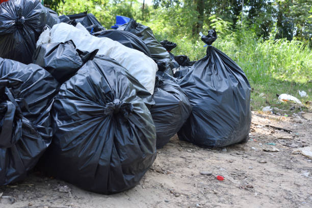 istock Garbage bags and trash on the street. Pollution concept 1199010256