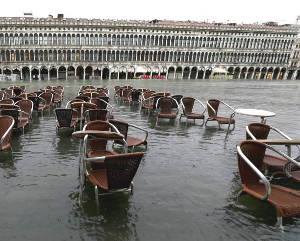istock Saint Mark Square under the water with chairs and tables during 1199013689