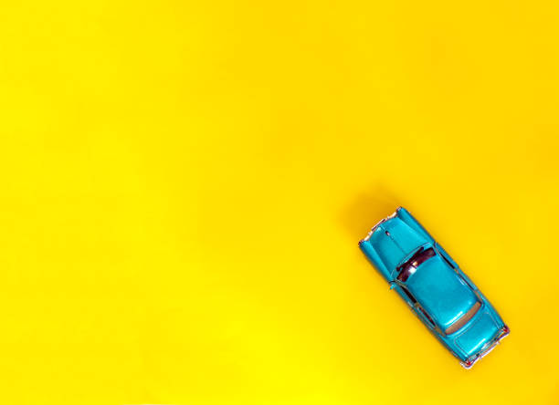 istock Children's background with a toy car 1199014908