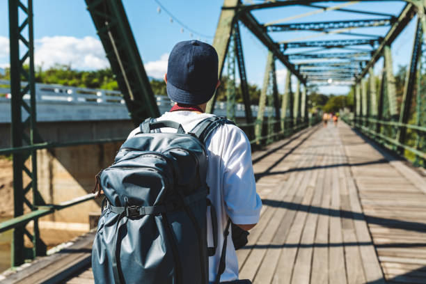 istock Traveler man with camera 1199014997
