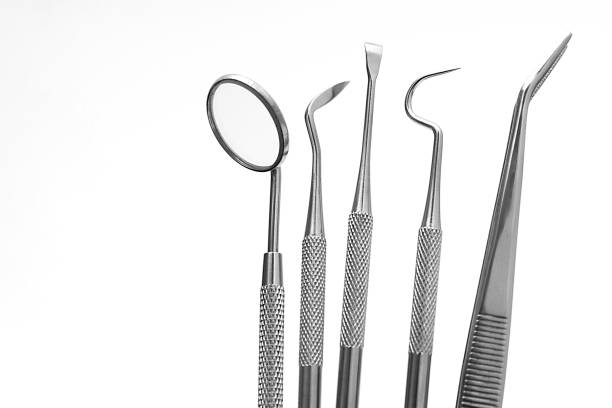 istock tooth dentist on white background 1199015084