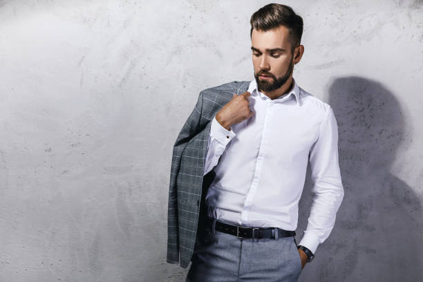 istock Handsome bearded man wearing gray suit 1199016642