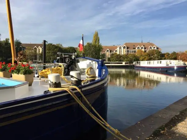 Photo of The Canal Port in Dijon is an old river harbor on the Burgundy Canal, a canal in central eastern France.