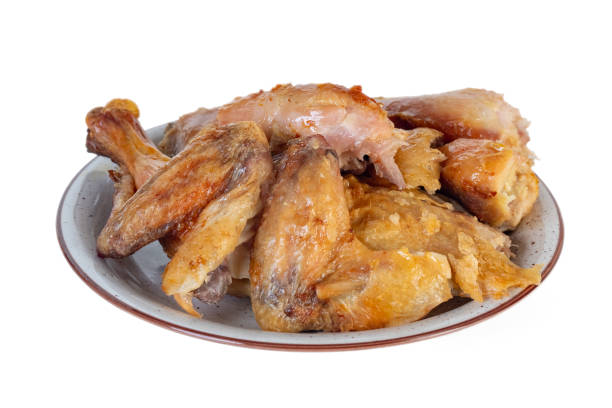 istock Roasted chicken on the plate isolated on white background 1199019209