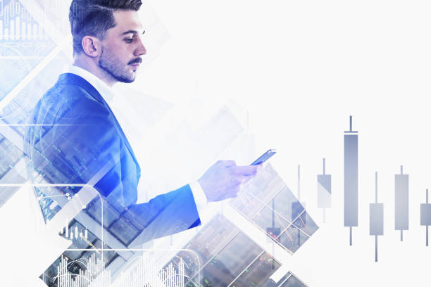 istock Businessman with phone in city, digital graph 1199020255