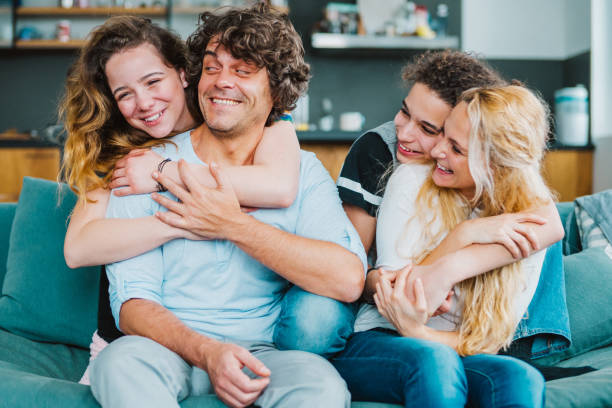 istock Family with teenagers having fun 1199026094