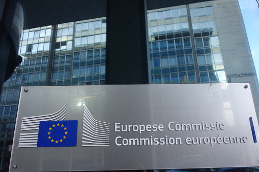 Brussels, Belgium - December 24, 2019: Signage of the European Commission at the entrance of the Berlaymont building, headquarters of the European Commission