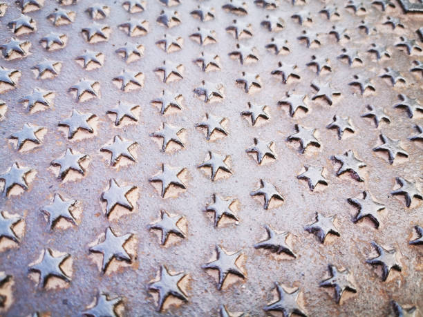 istock iron stars steel texture 1199030276