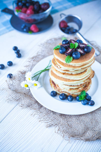 istock Delicious homemade pancakes with berries 1199030431