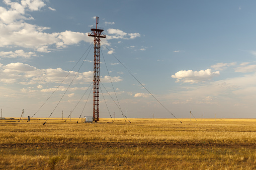 Iron Cell Tower with steel cables, cell tower in the steppes of Kazakhstan
