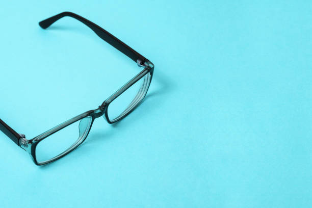 istock Glasses for reading, computer work and eye protection. Plastic glasses with a black frame. Optical device for vision correction 1199035523