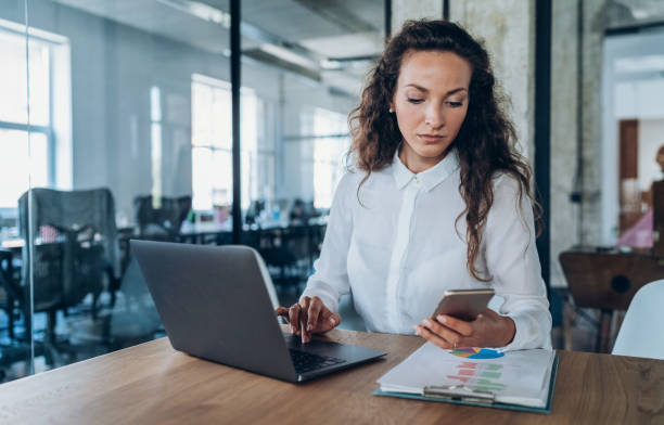 istock Businesswoman working in the office 1199036986