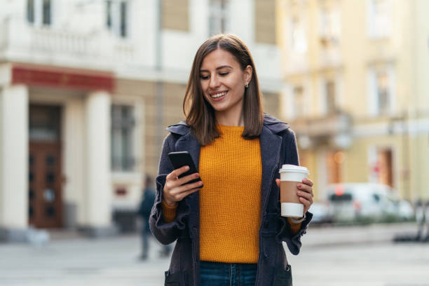 istock Texting in the city 1199036989
