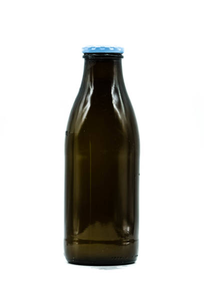 istock Milk bottle isolated on white background 1199037184