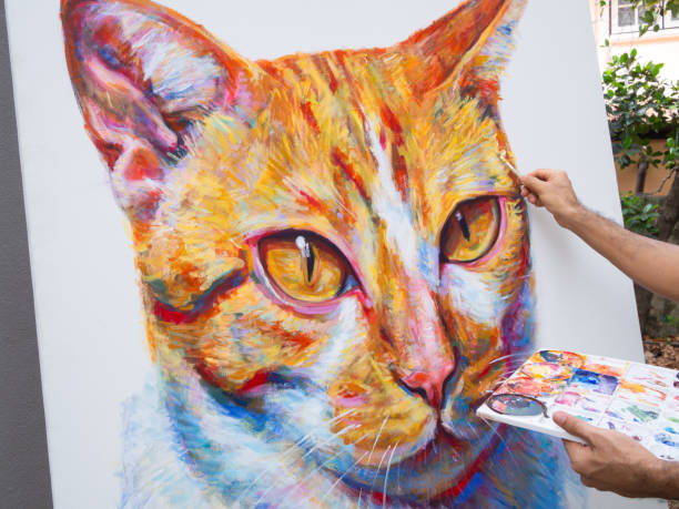 istock Artist paint portrait ginger cat 1199037494