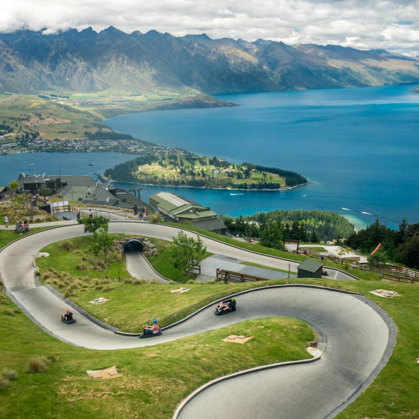 Luge track with mountains in the background at Queenstown Skyline site stock photo