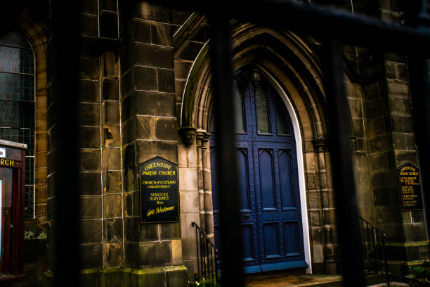 Edinburgh, Scotland - March 20, 2019 - Street view of Greenside Parish Church, a gothic church located at the greenside path of Calton hill