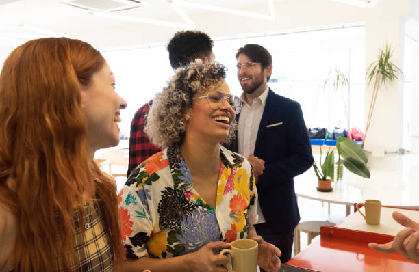 istock Coffee break in co-working business team 1199044398