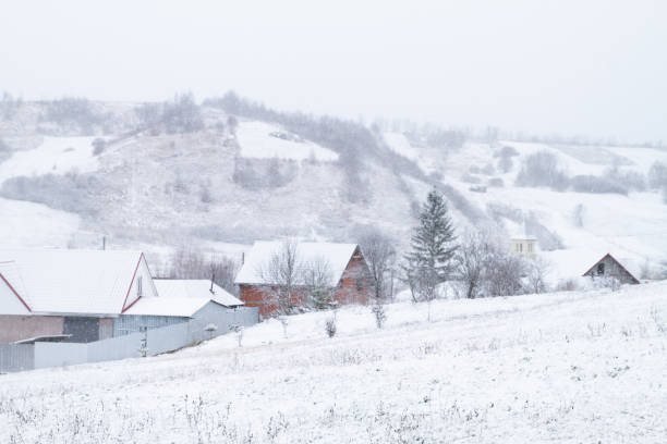 istock White winter landscape with snowfall 1199044798