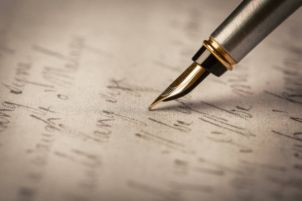 istock Fountain pen on an ancient handwritten letter. Old story. Retro style. 1199046462