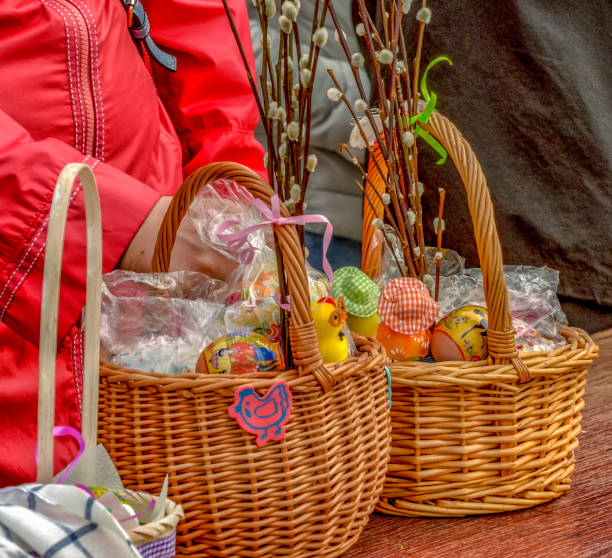 istock Easter eggs and cakes on lighting near the temple. 1199048610