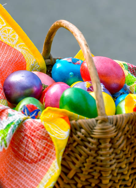 istock Easter eggs and cakes on lighting near the temple. 1199048657