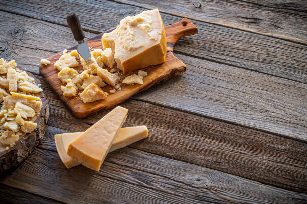 istock Parmesan Reggiano cheese on cutting board 1199052617