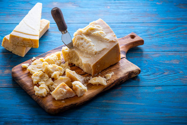 istock Parmesan Reggiano cheese on cutting board 1199053197