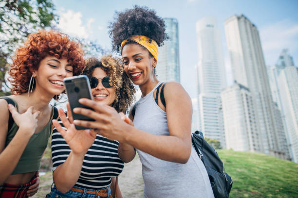istock Three young women taking selfie 1199053327