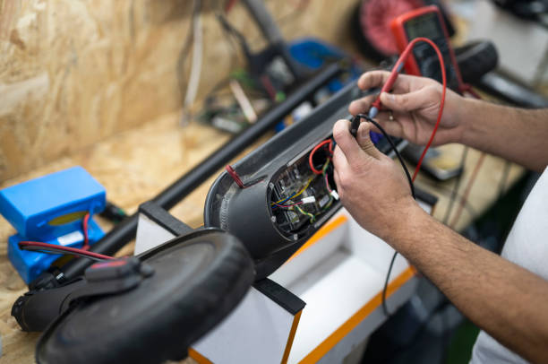 istock Repair of electronic devices. Microelectronics engineering and technology concept. Electric scooter service 1199053626