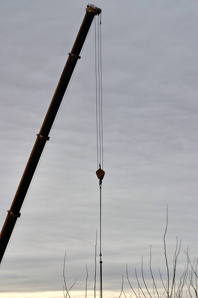 istock the crane works on the construction of the object 1199055745