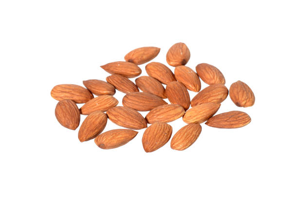 istock Tasty almonds nuts isolated on white background 1199055995