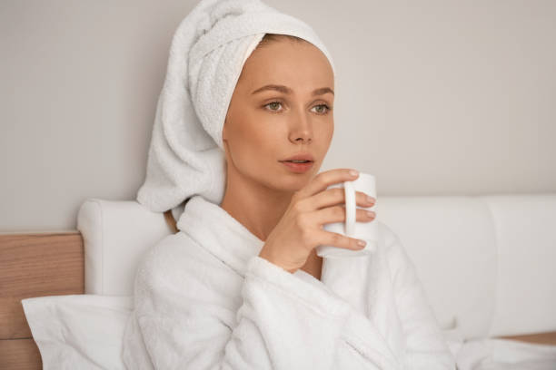 istock Girl enjoying breakfast in bed. 1199057925