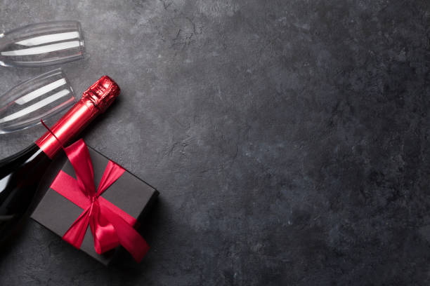 istock Valentines day gift box and champagne 1199059024