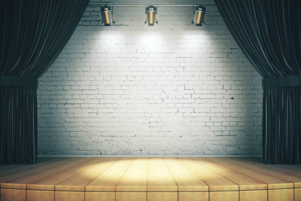 istock Wooden stage with black curtains 1199059270