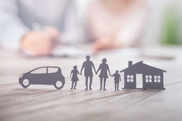 Insurance protecting family health live, house and car concept. Insurance protecting family health live, house and car concept. Cut elements from paper that symbolize the coverage. insurance agent photos stock pictures, royalty-free photos & images